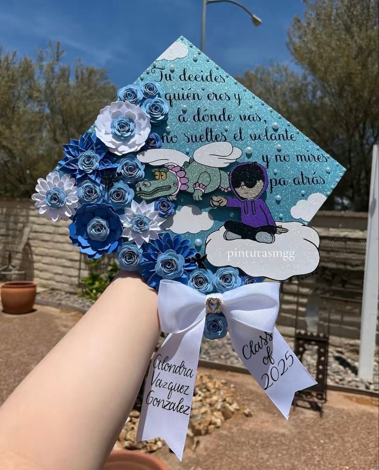 Junior H Blue Grad Cap