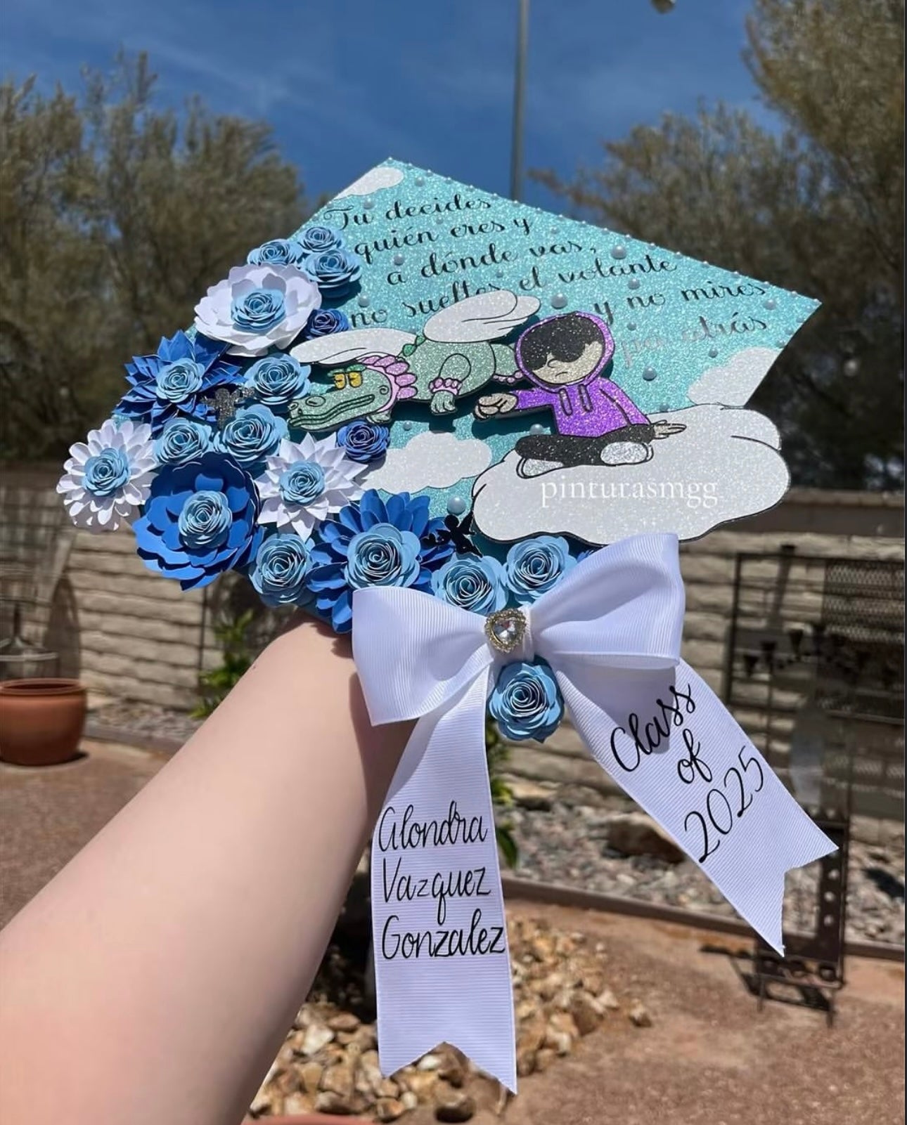 Junior H Blue Grad Cap